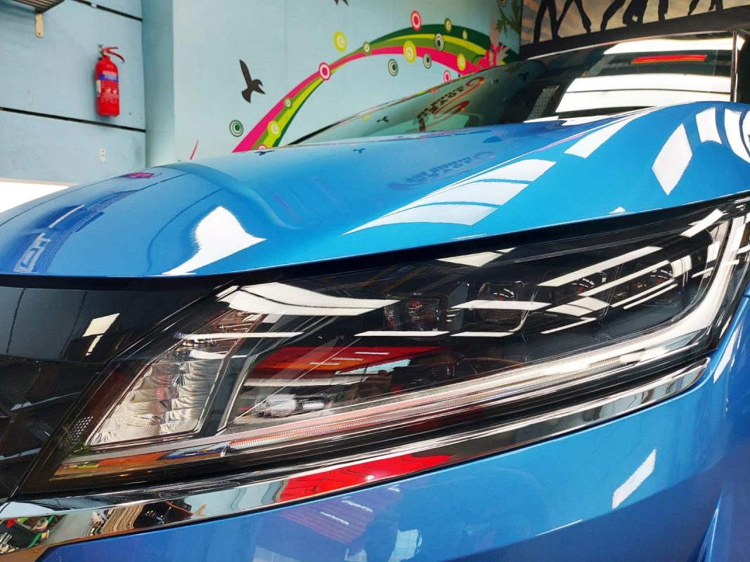 The Note's coated paintwork showing clean reflections.