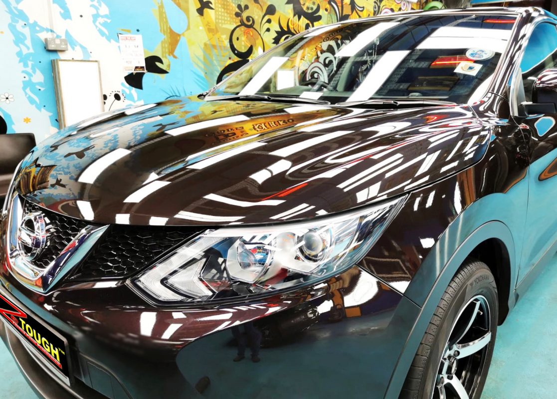 The Nissan Qashqai from a side angle after the ceramic coating.