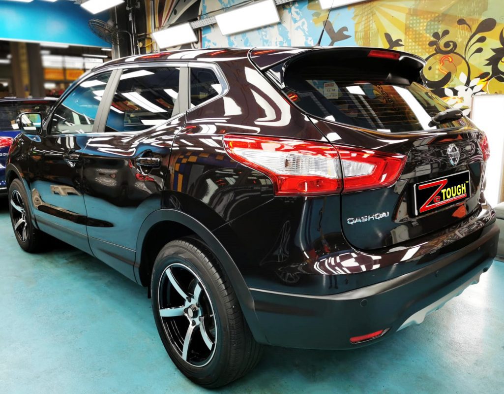 Rear quarter of the Nissan Qashqai, glossy and protected.