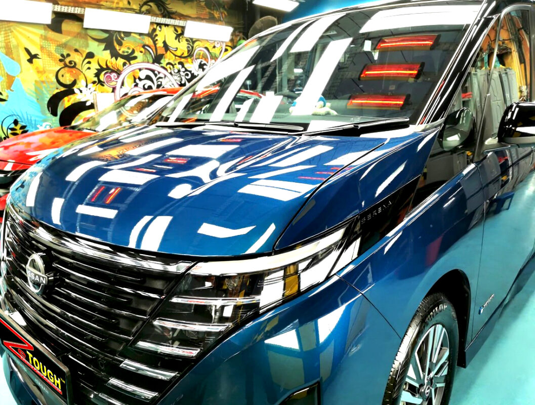 The Nissan Serena from a side angle after the ceramic coating.