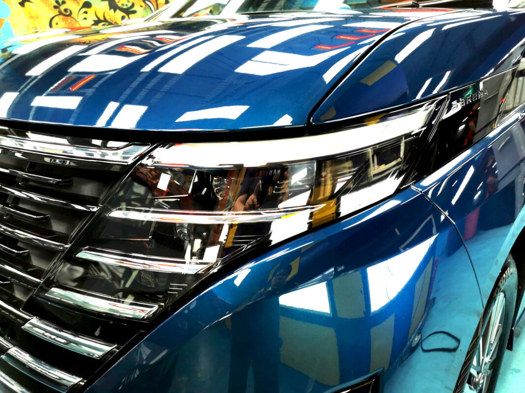 The Nissan Serena's coated paintwork showing clean reflections.