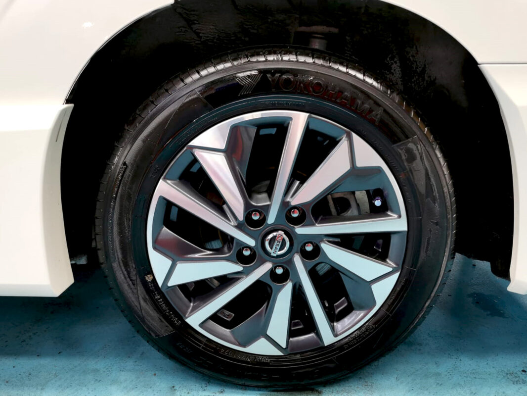 The Nissan Serena parked in the workshop, freshly coated.