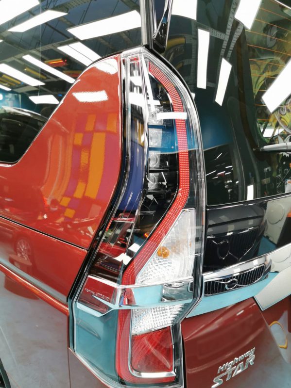 Wheel and arch detail of the sealed Nissan Serena.