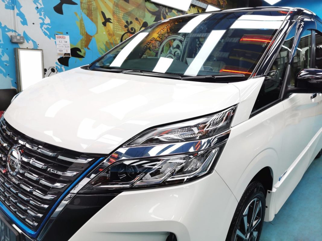 The Nissan Serena from a side angle after the ceramic coating.