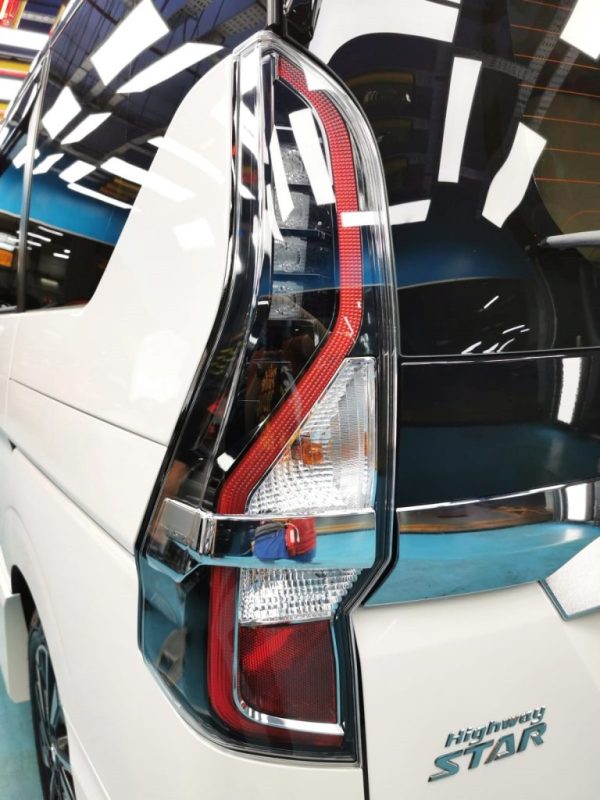 Wheel and arch detail of the sealed Nissan Serena.