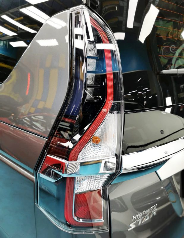 Wheel and arch detail of the sealed Nissan Serena.