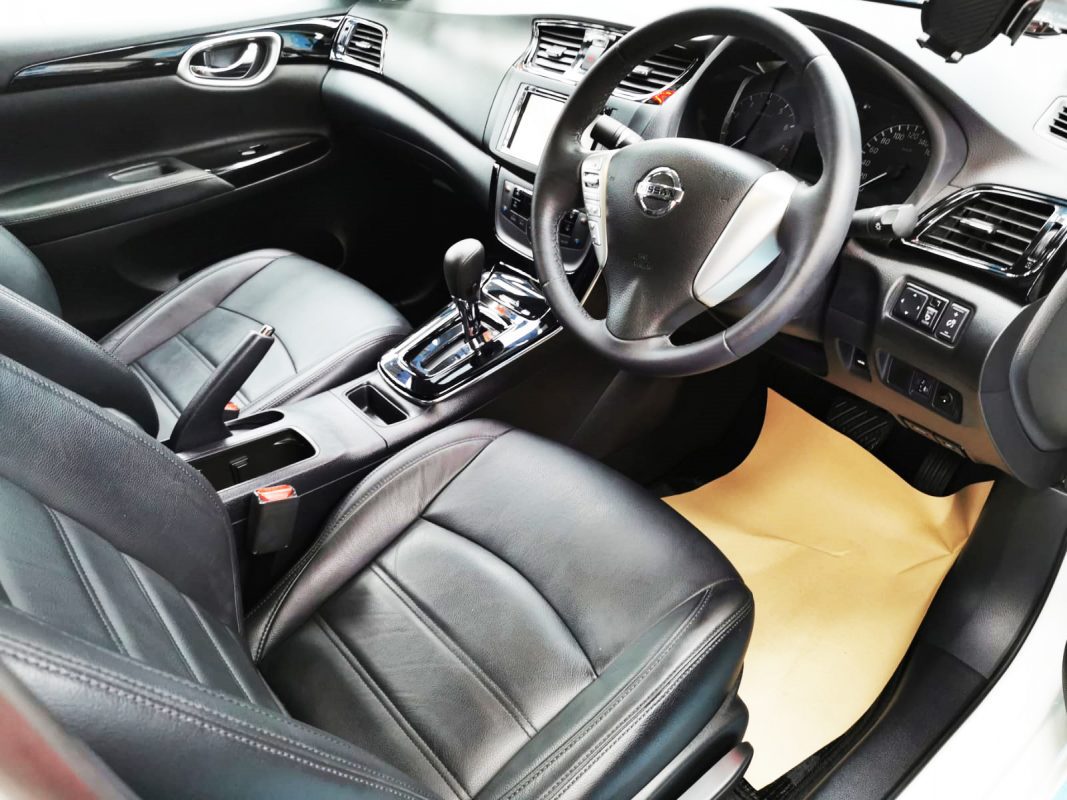 Front three-quarter view of the coated Nissan Sylphy.