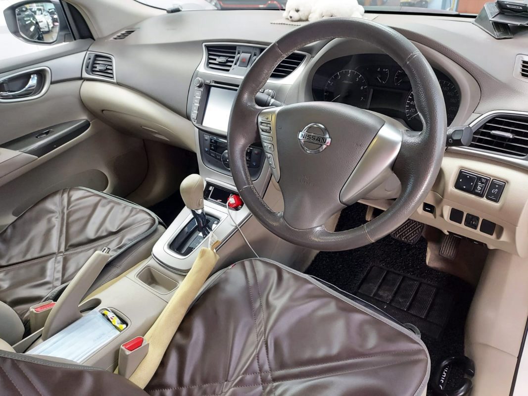 Front three-quarter view of the coated Nissan Sylphy.
