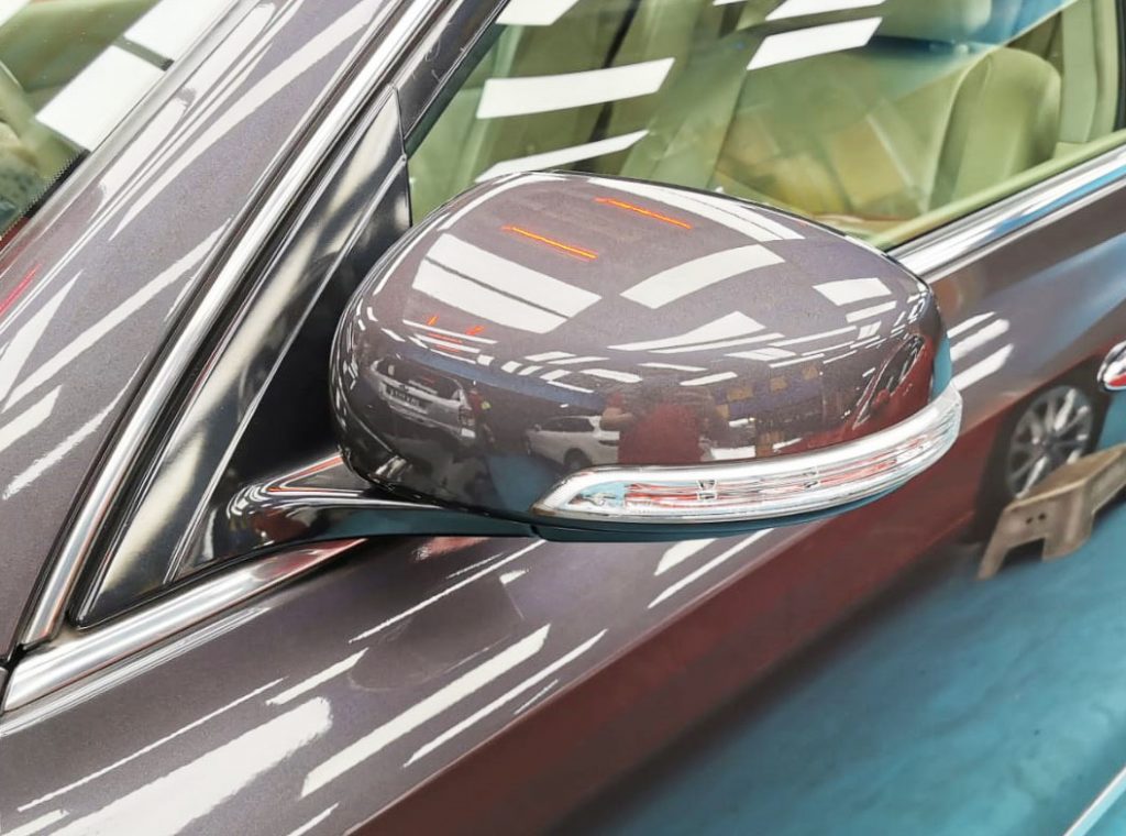 Rear quarter of the Nissan Teana, glossy and protected.