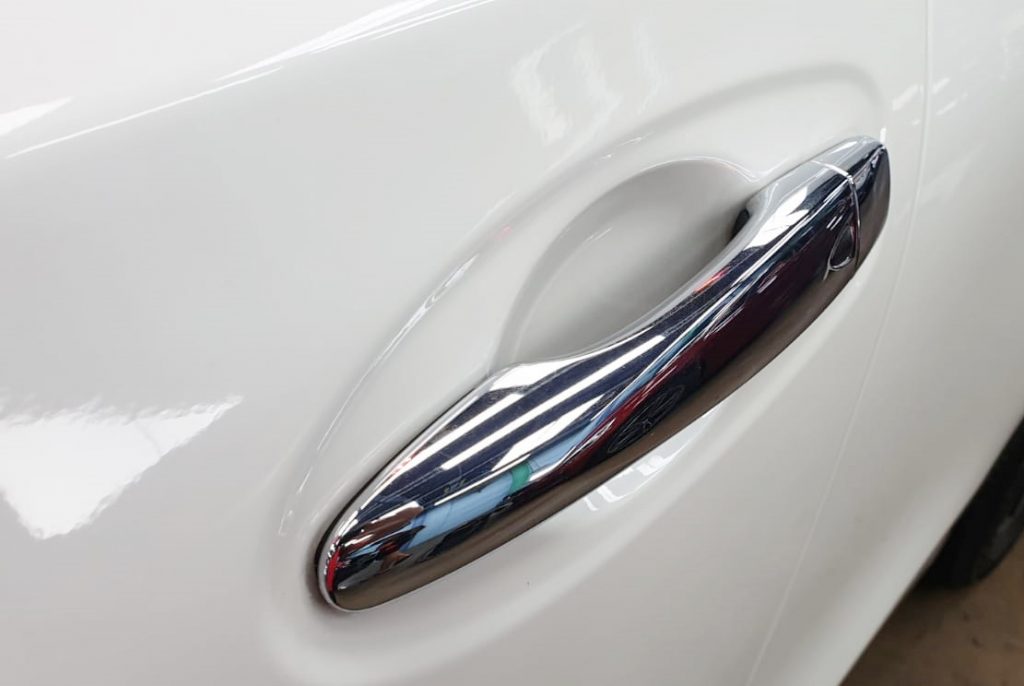 Rear quarter of the Nissan X-Trail, glossy and protected.