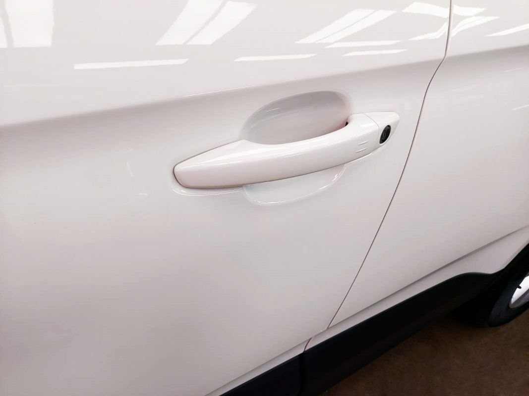 Rear quarter of the Opel Grandland X, glossy and protected.