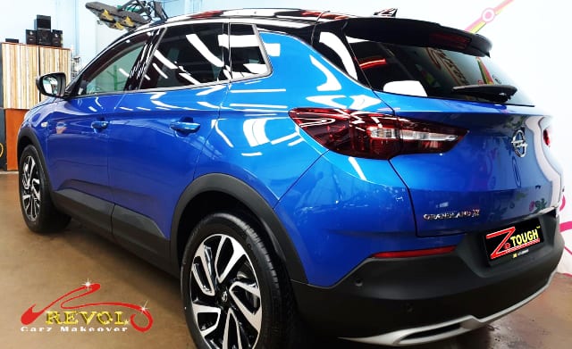 Rear quarter of the Opel Grandland X, glossy and protected.