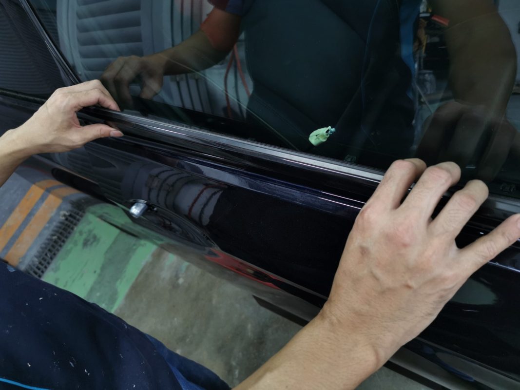 Parts being dismantled from the Insignia in preparation for spraying.