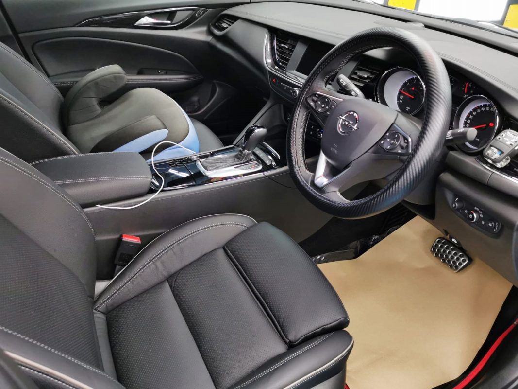 Front three-quarter view of the coated Opel Insignia Grandsport.