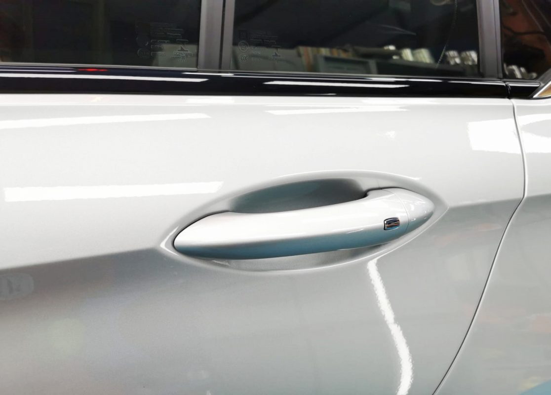 Rear quarter of the Opel Insignia Grandsport, glossy and protected.