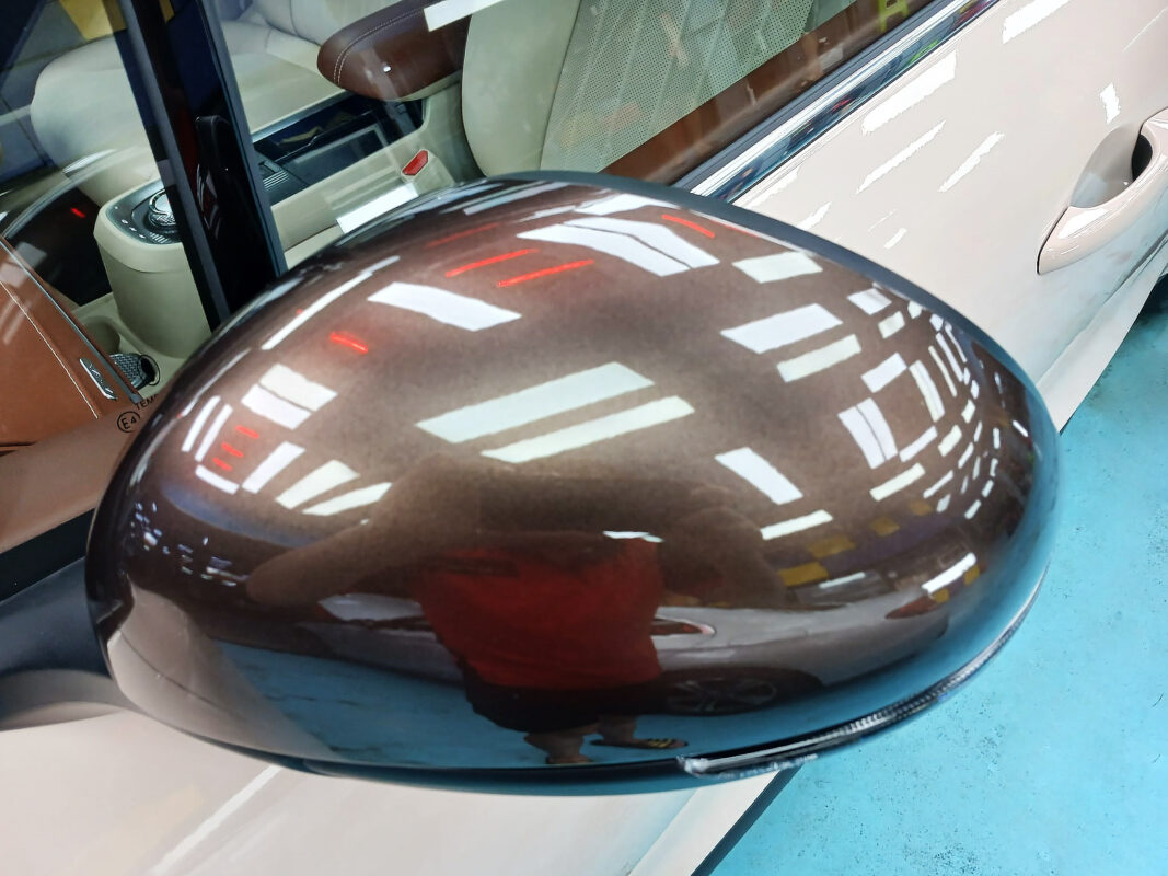 Rear quarter of the Ora Good Cat, glossy and protected.