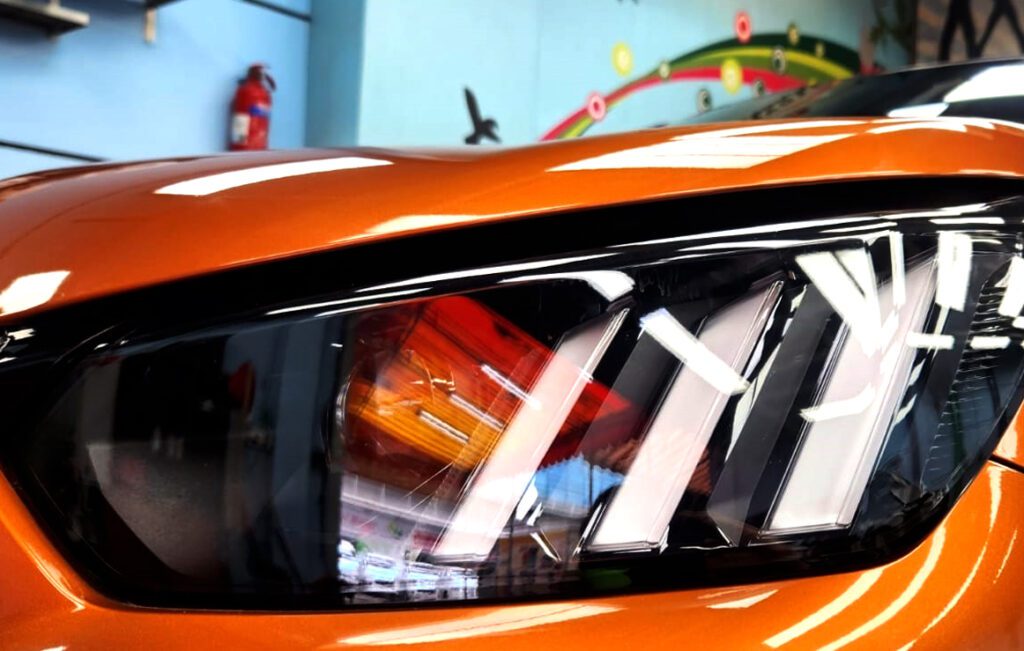 The 2008's coated paintwork holding clean reflections.