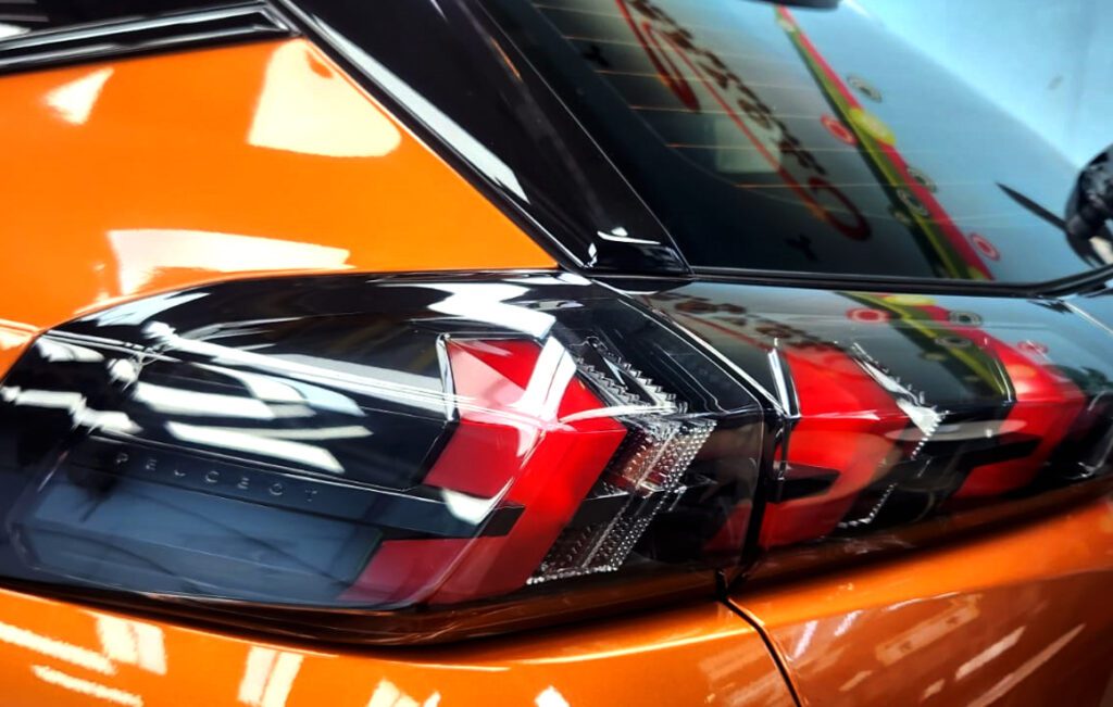 Close-up of the 2008's coated surface under workshop lighting.