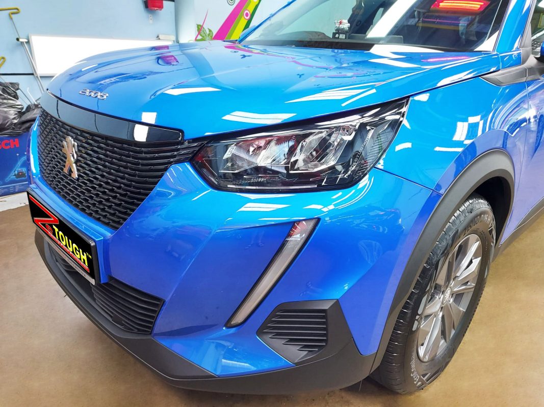 The Peugeot 2008 from a side angle after the ceramic coating.