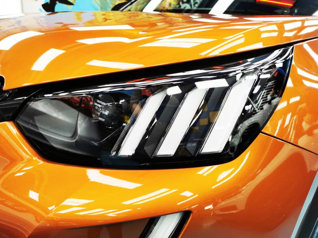 The 2008's coated paintwork showing clean reflections.