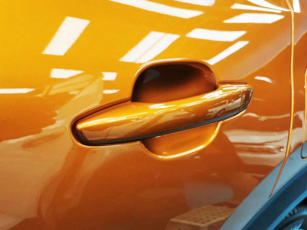 Rear three-quarter view of the Peugeot 2008, glossy and protected.