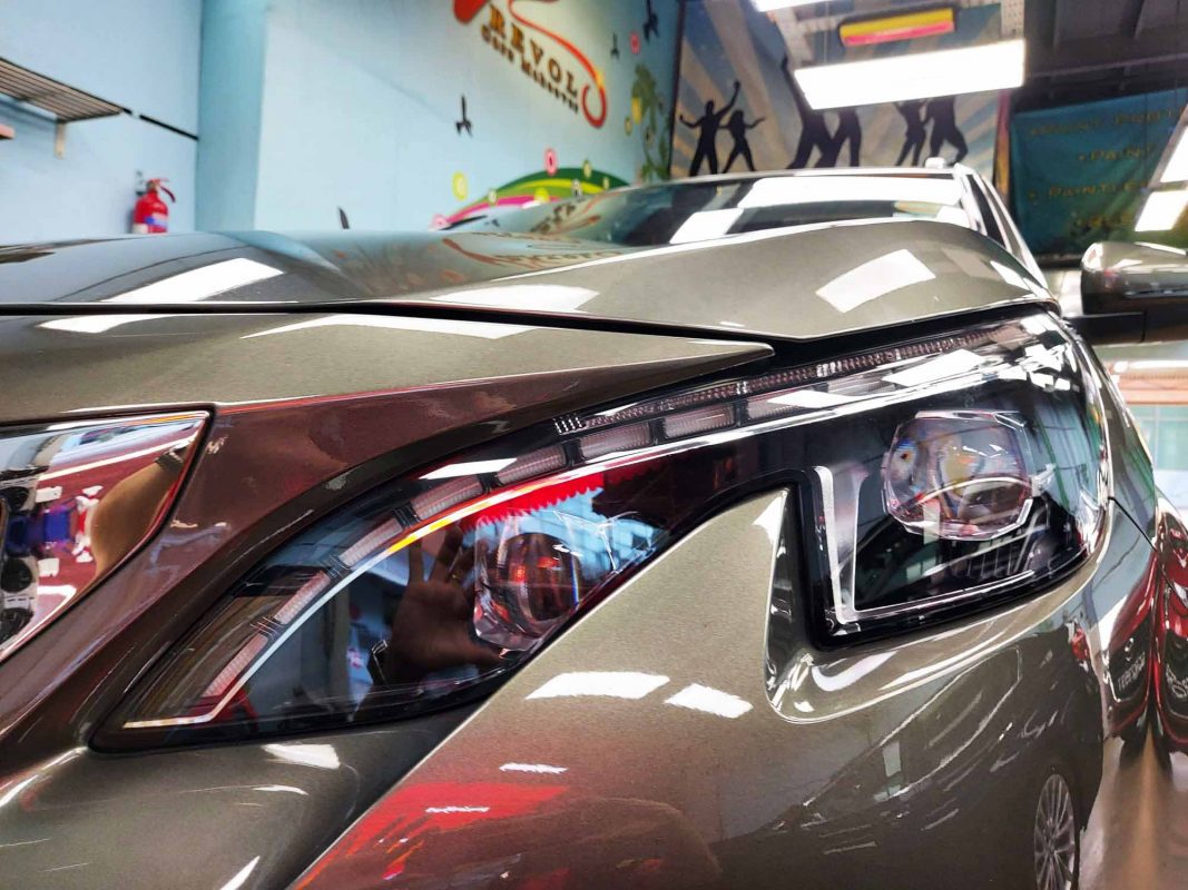 The 3008's coated paintwork showing clean reflections.