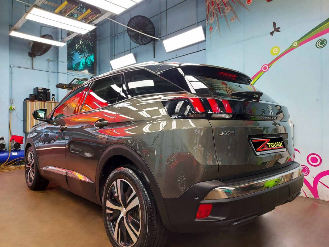 Rear quarter of the Peugeot 3008, glossy and protected.