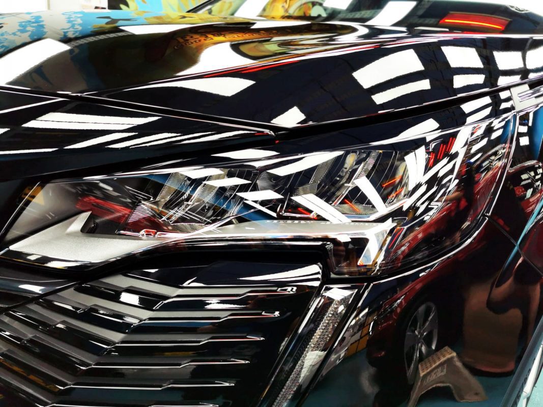The 3008's coated paintwork showing clean reflections.