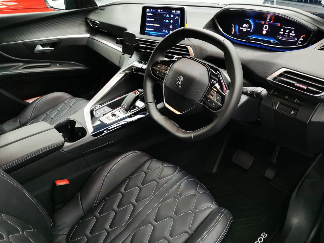 The Peugeot 3008 parked in the workshop, freshly coated.