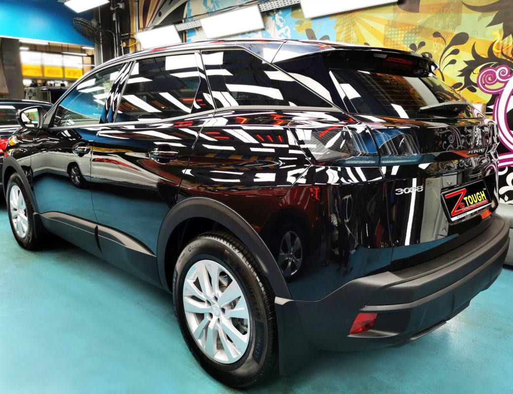 Rear quarter of the 3008, glossy and protected.