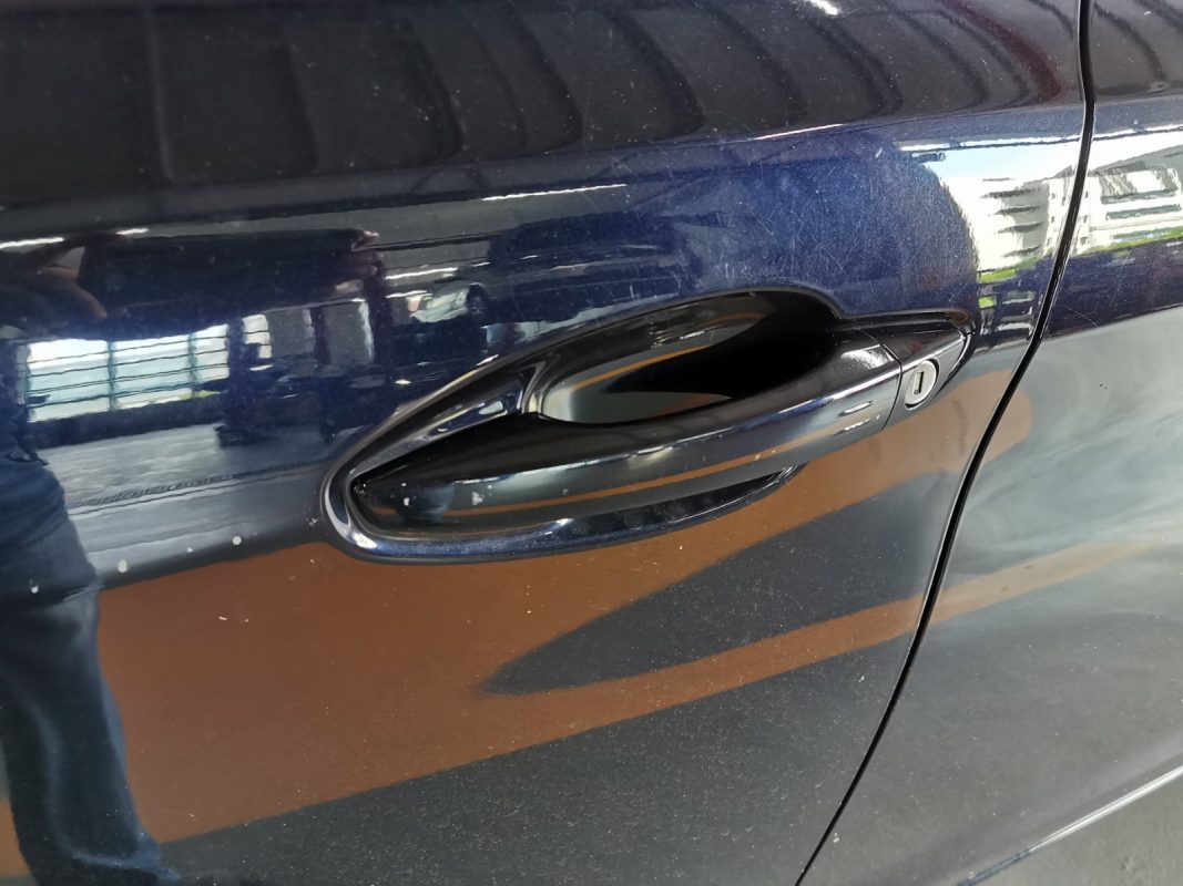 Dents and chipped paintwork on the 308 at intake.