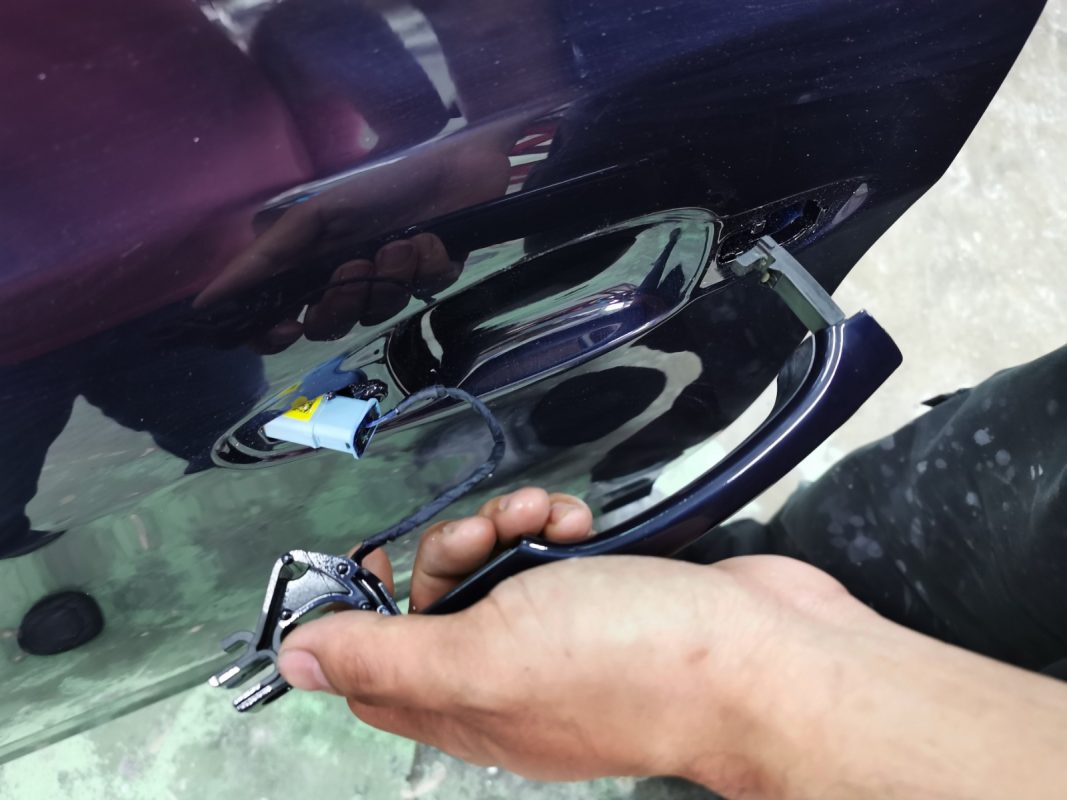 Previously removed car parts being refitted onto the 308.