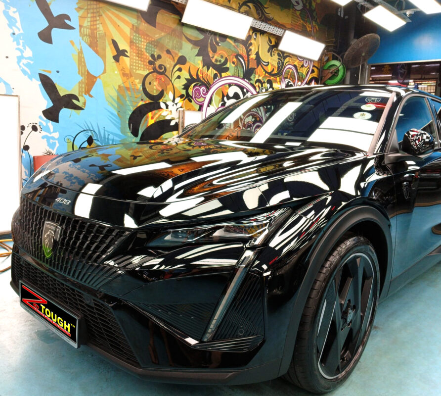 Side view of the Peugeot 408 after the titanium coating.