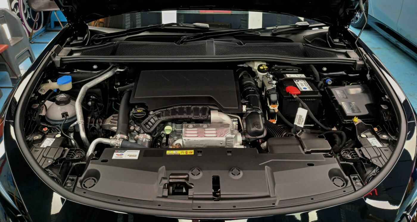 Front three-quarter view of the Peugeot 408, freshly coated.