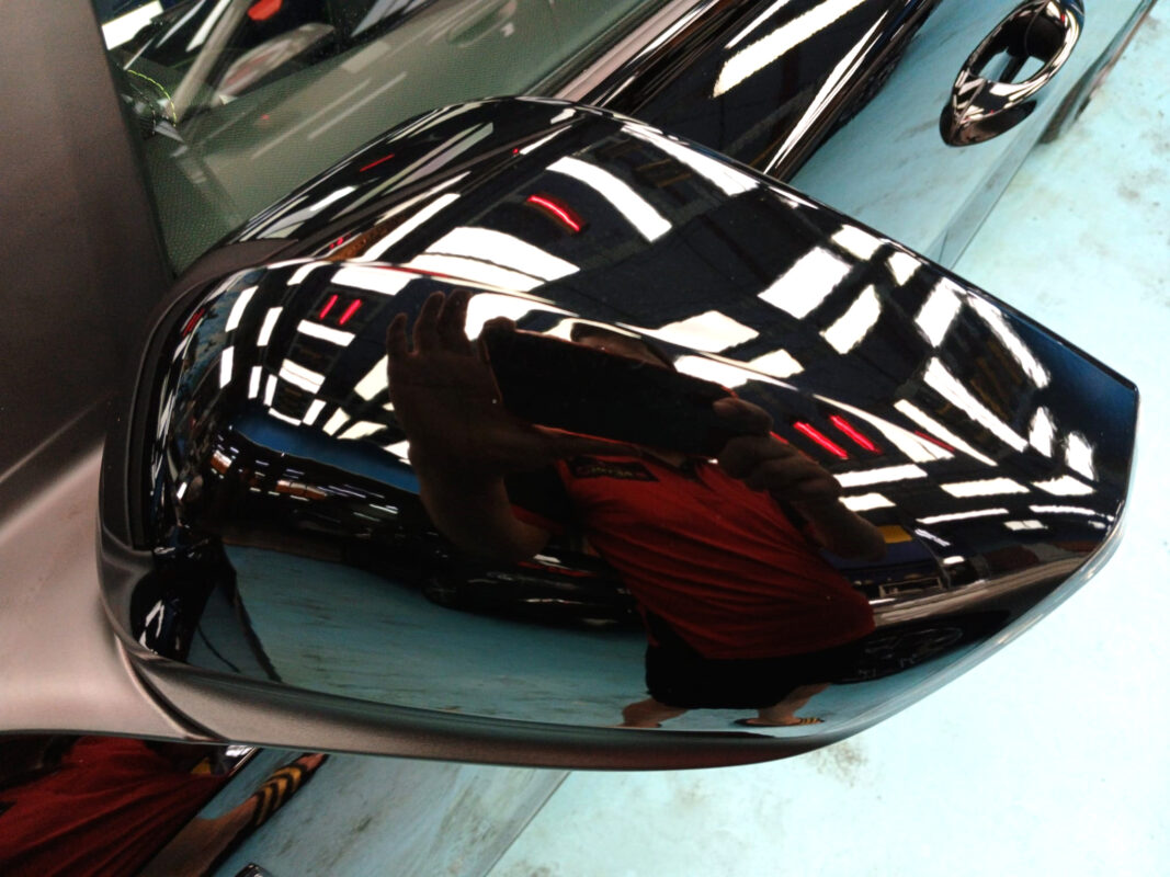 Rear quarter of the Peugeot 408, glossy and protected.