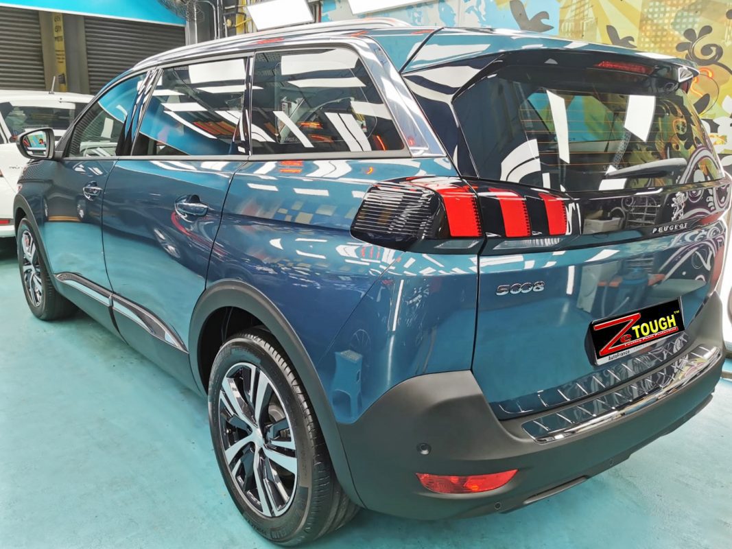 Rear quarter of the Peugeot 5008, glossy and protected.