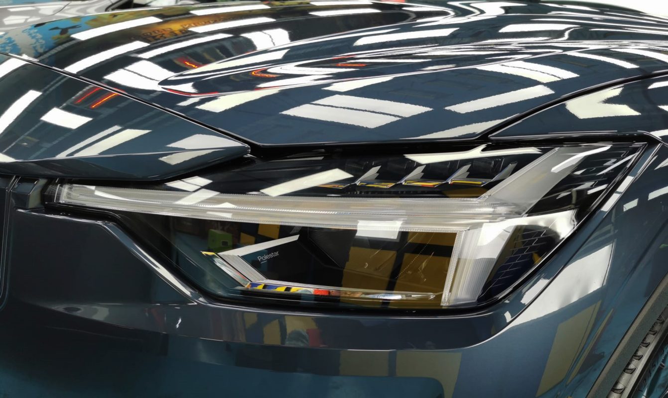 The Polestar 2's coated paintwork showing clean reflections.