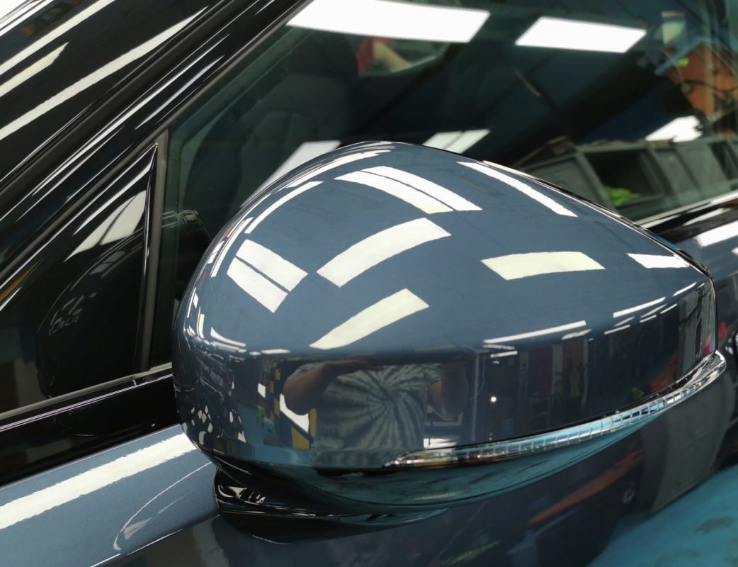 Side panel of the Polestar 2 with the titanium finish locked in.