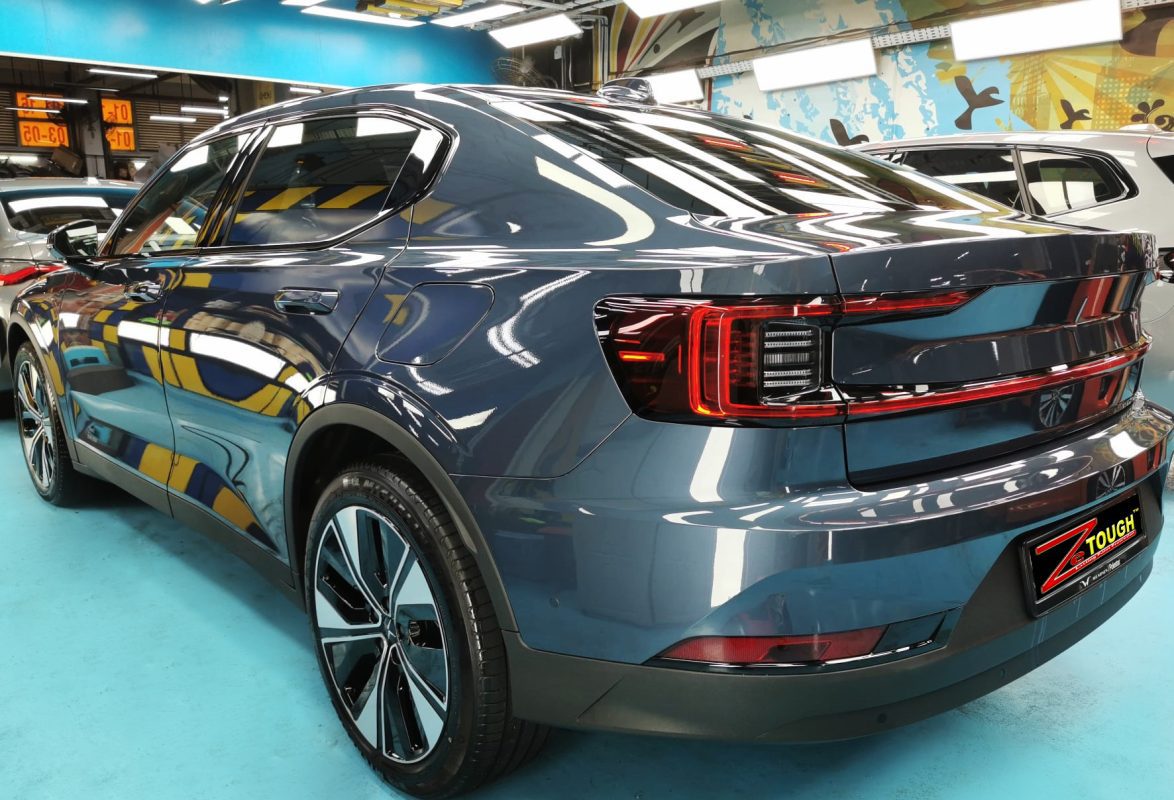 Rear quarter of the Polestar 2, glossy and protected.