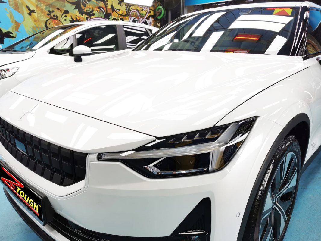 The Polestar 2 from a side angle after the ceramic coating.