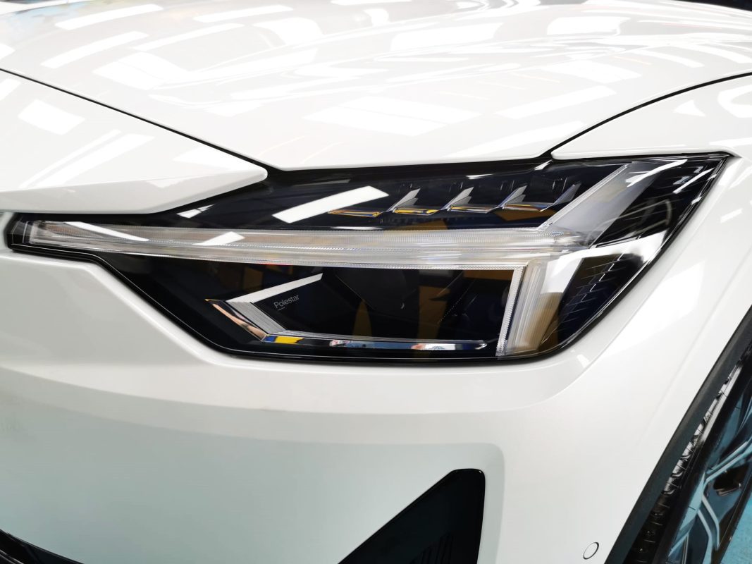 The Polestar 2's coated paintwork showing clean reflections.