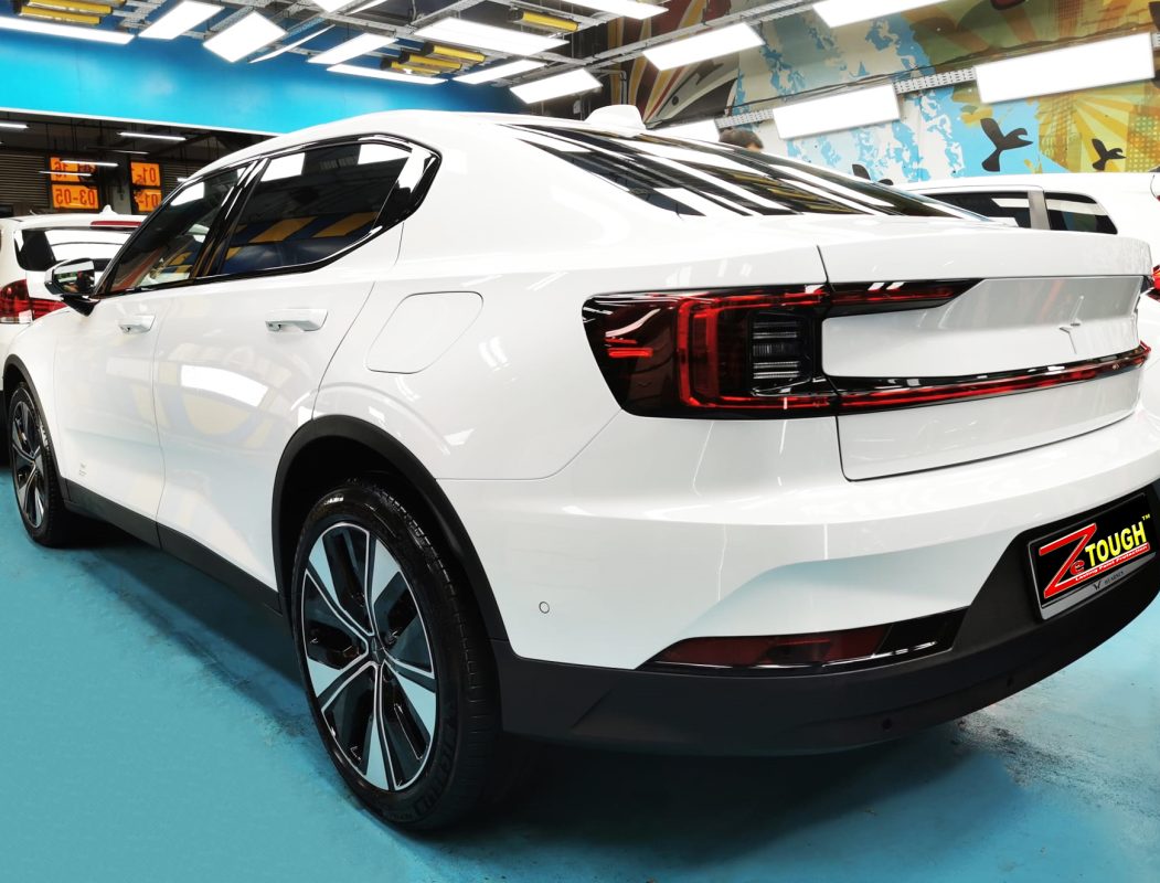Rear quarter of the Polestar 2, glossy and protected.