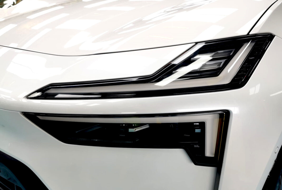 The Polestar 4's coated paintwork showing clean reflections.