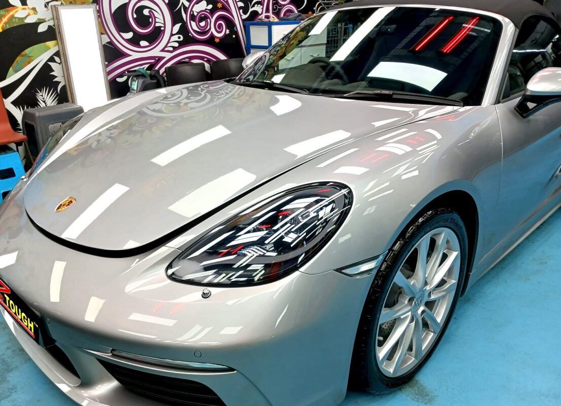 Side view of the Porsche 718 Boxster after the ceramic coating.