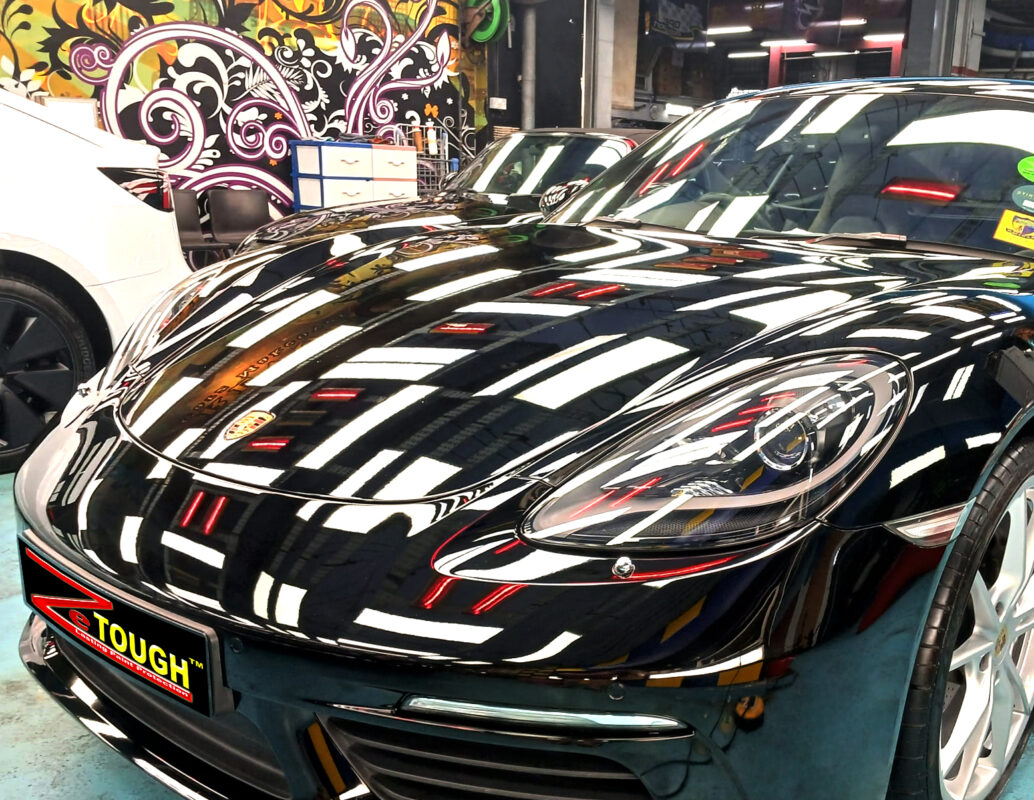 Side view of the Porsche 718 Cayman after the ceramic coating.