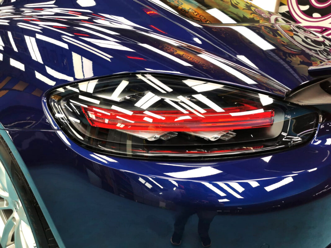 Before: the Porsche 718 Cayman with its original worn paintwork, stone chips evident.