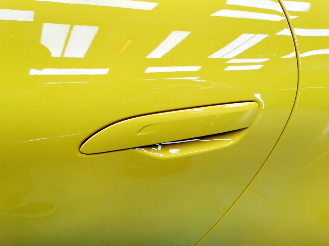 Side panel of the 911 Carrera S with the titanium finish locked in.