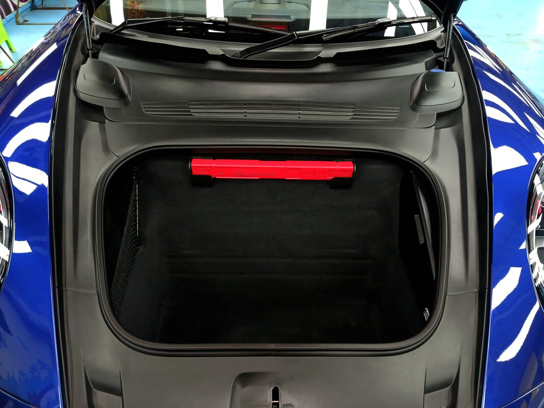 Front three-quarter view of the Porsche 911 Carrera, sealed and protected.