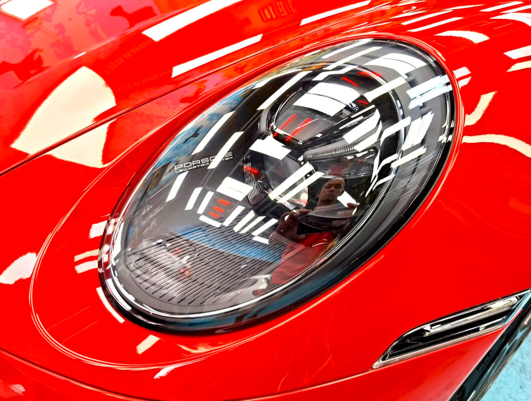 Glossy bodywork of the Porsche 911 Carrera after coating.