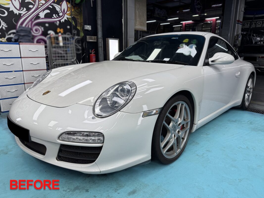 White Porsche 911 Carrera S, glossy after its full respray.